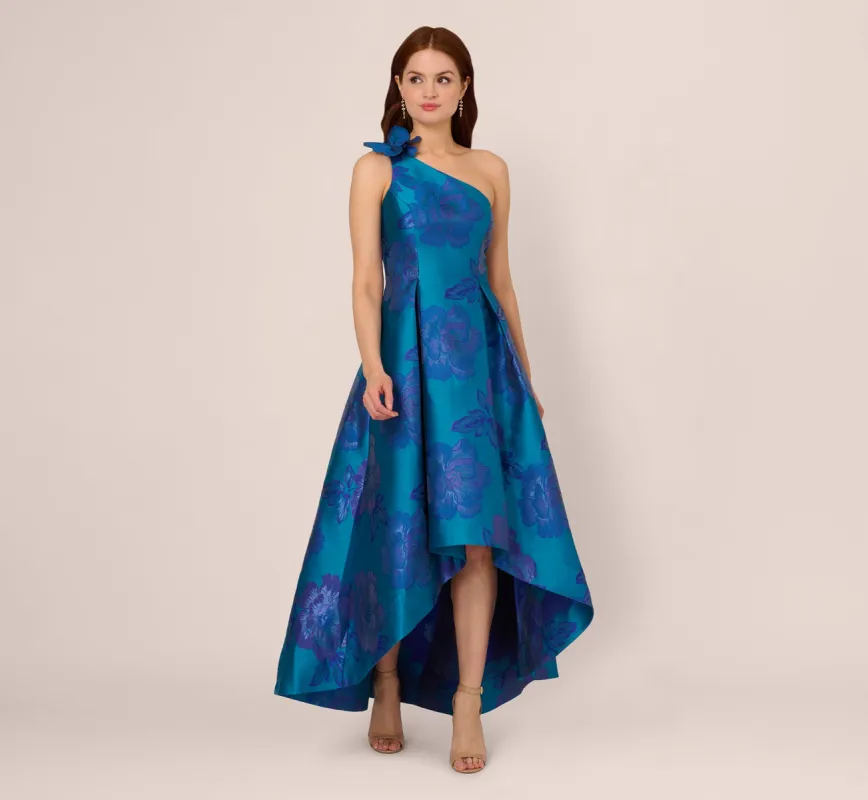 Floral Jacquard One Shoulder High Low Gown With Rosette Accent In Teal Blue sold by Adrianna Papell