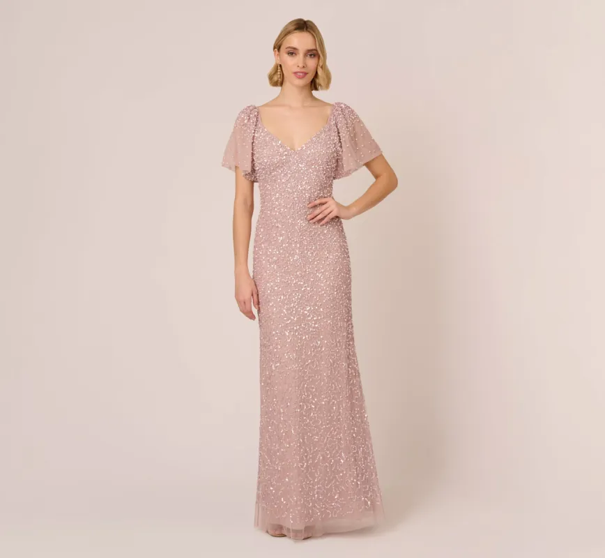 Pearl Beaded Mermaid Gown With Flutter Sleeves In Cameo sold by Adrianna Papell