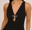 Sleeveless Crepe Mini Dress With Rhinestone Bow Accent In Black sold by Adrianna Papell