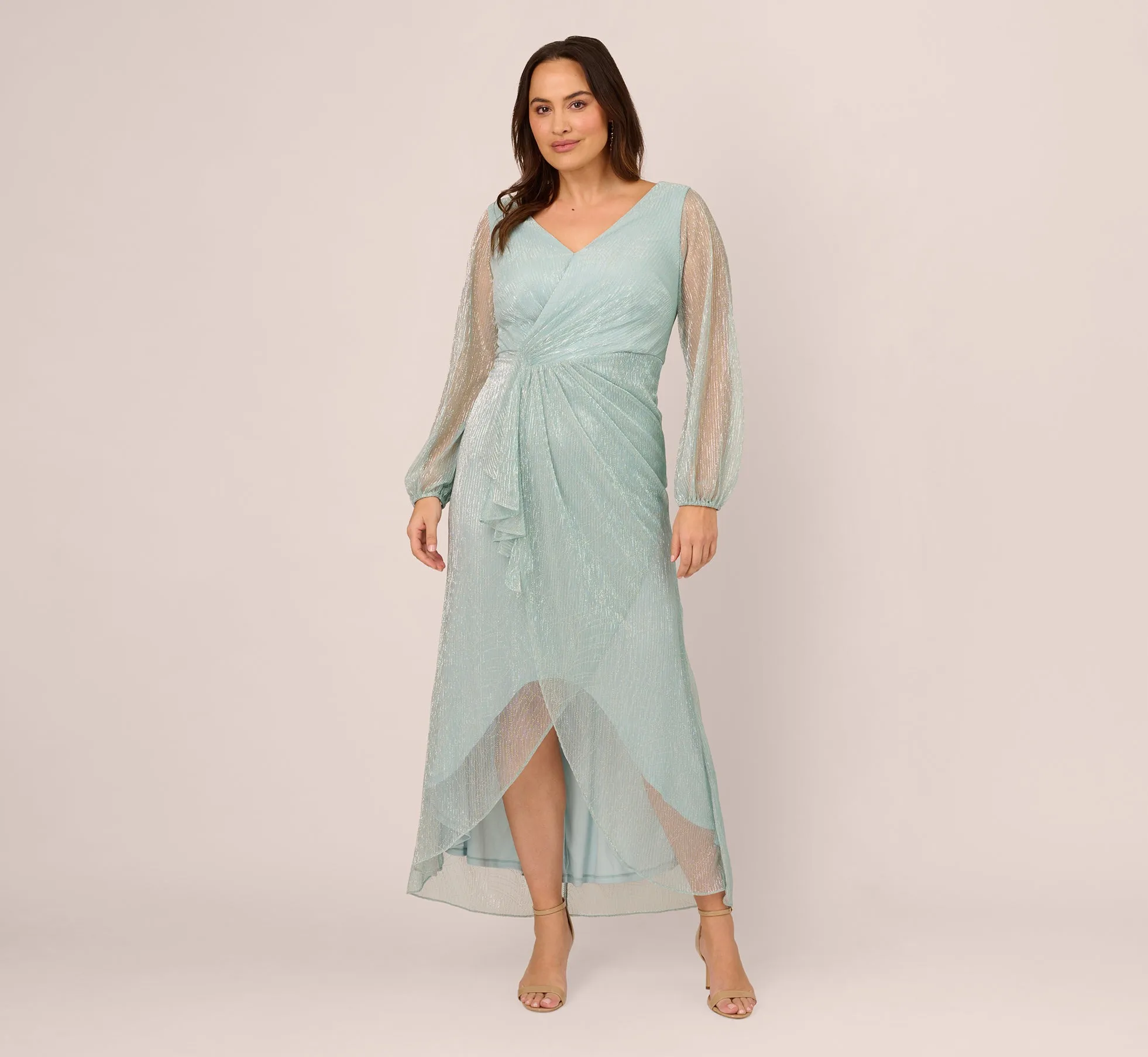 Plus Size Crinkle Metallic Gown With Sheer Bishop Sleeves And Draped Details In Mint Smoke sold by Adrianna Papell