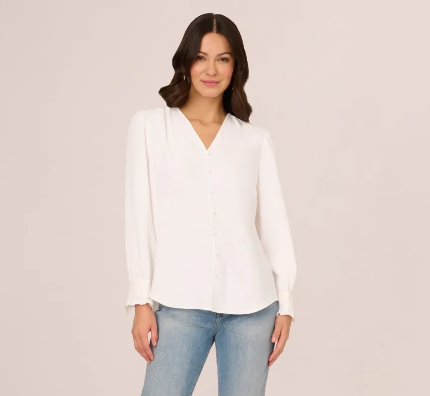 Long Sleeve Covered Button Up Top With V Neck In Ivory sold by Adrianna Papell