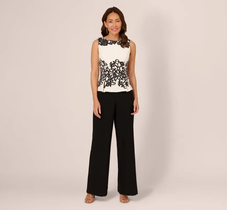 Sleeveless Peplum Jumpsuit With Scroll Lace Details In Ivory Black sold by Adrianna Papell