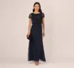 Jasmine Beaded Blouson Gown With Sheer Short Sleeves In Navy Black sold by Adrianna Papell