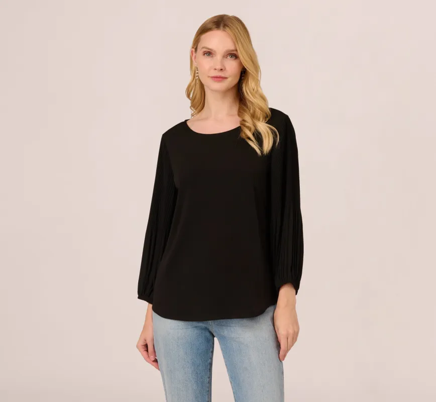 Knit Top With Pleated Sleeves In Black sold by Adrianna Papell