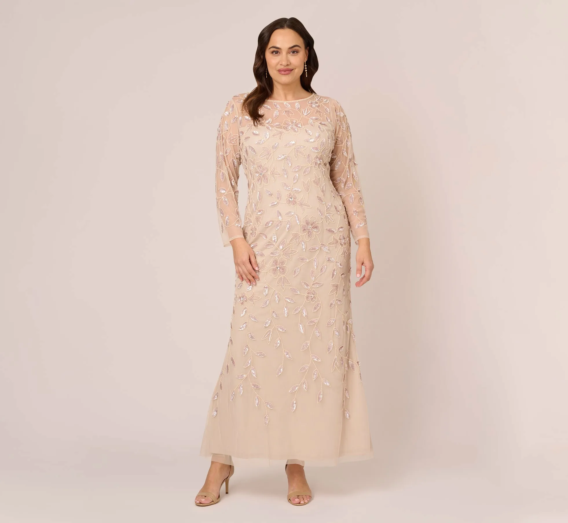 Plus Size Illusion Floral Beaded Gown With Sheer Long Sleeves In Latte sold by Adrianna Papell