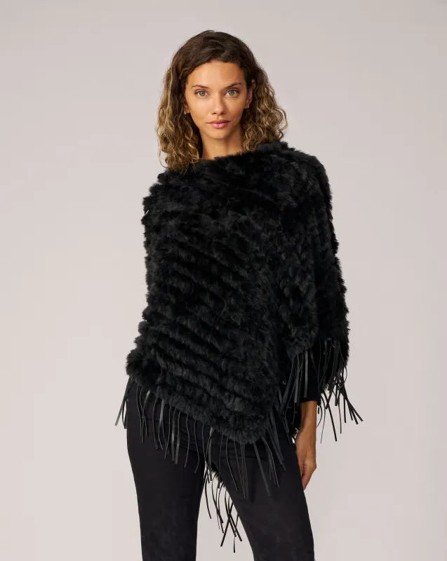 Faux Fur Fringe Poncho sold by Adrienne Landau