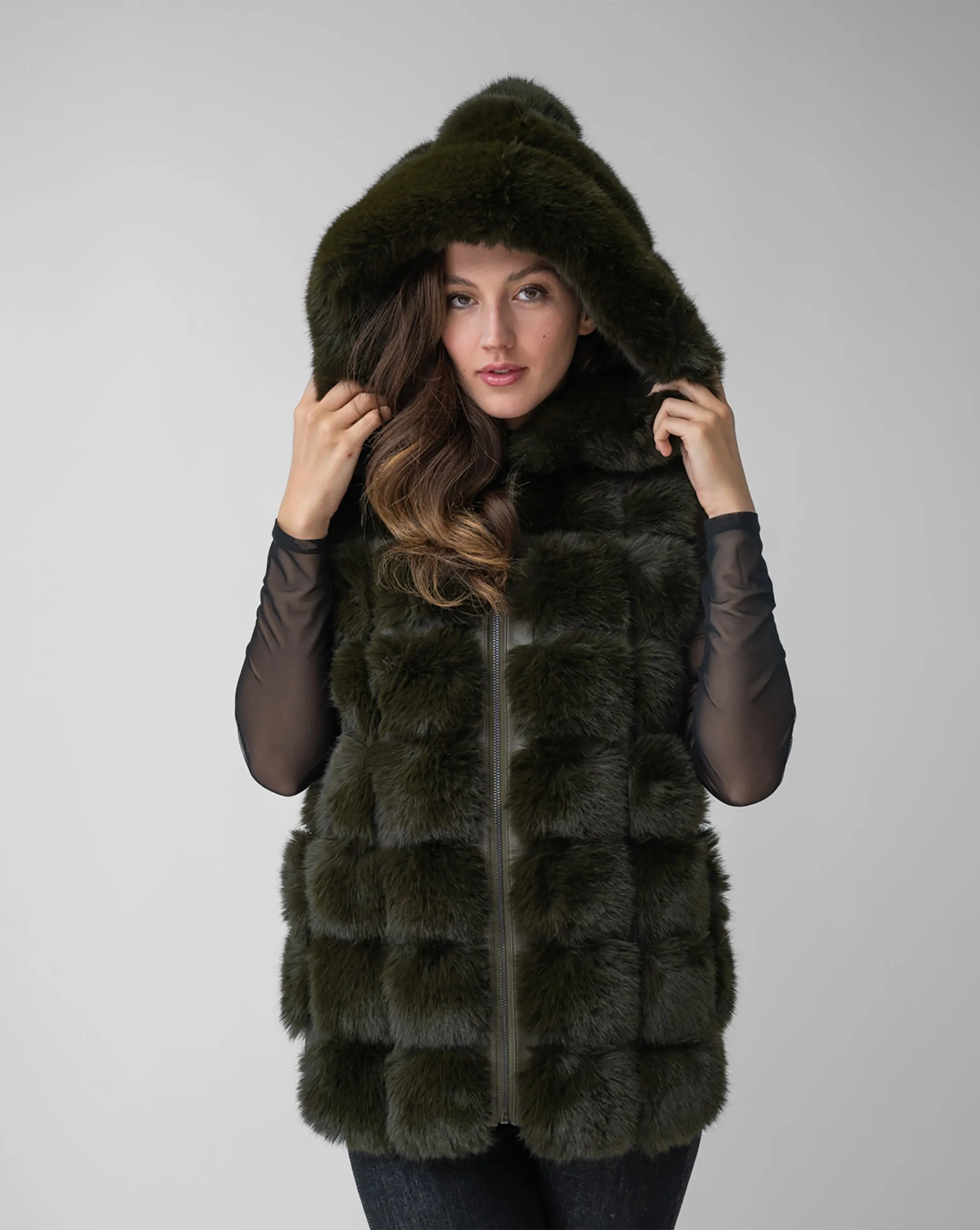 Faux Fur & Faux Leather Hooded Vest sold by Adrienne Landau