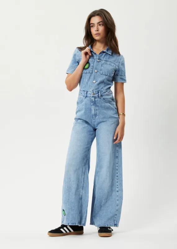 Afends Womens House Of Darwin Miami - Hemp Denim Flared Jumpsuit - Worn Blue sold by Afends