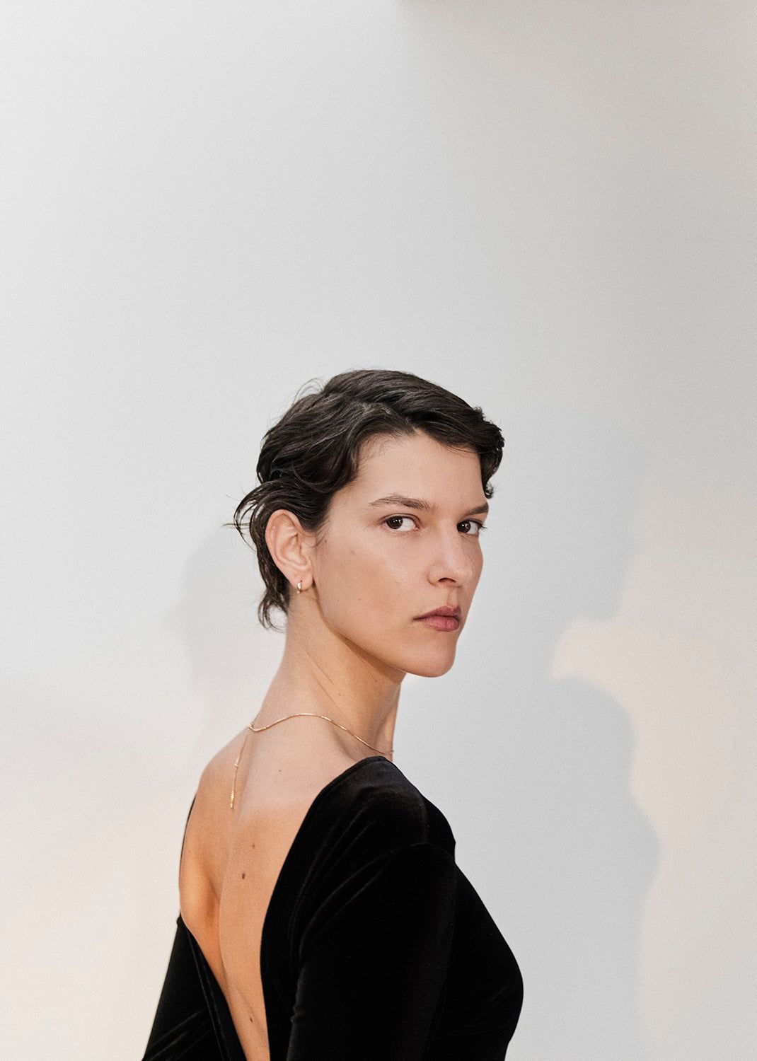 Corrin Bodysuit in Black sold by Agolde