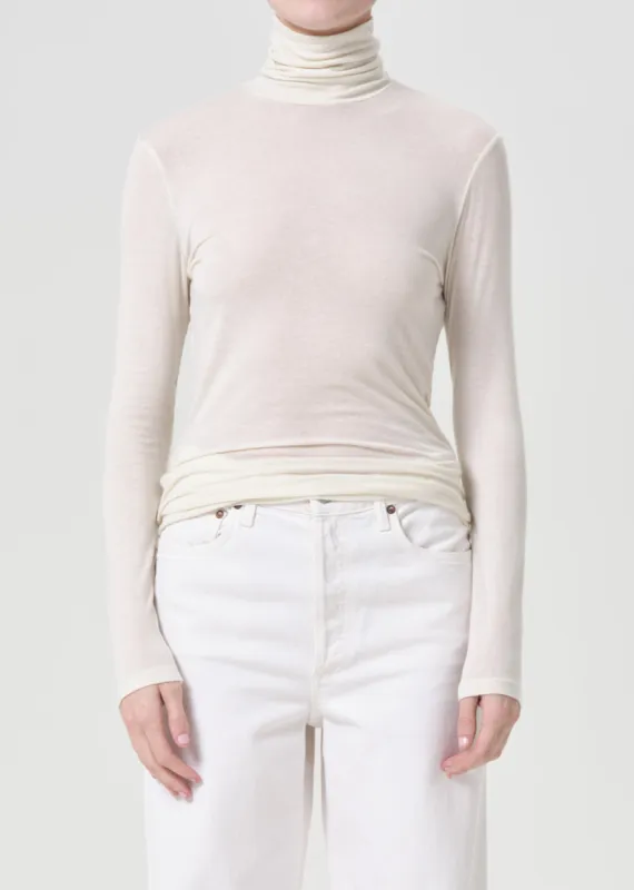 Pascale Turtleneck in Oat Milk sold by Agolde