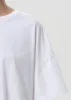 Arli Oversized Cropped Tee in White sold by Agolde