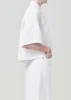 Rona Box Shirt in Milkshake sold by Agolde