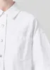Rona Box Shirt in Milkshake sold by Agolde