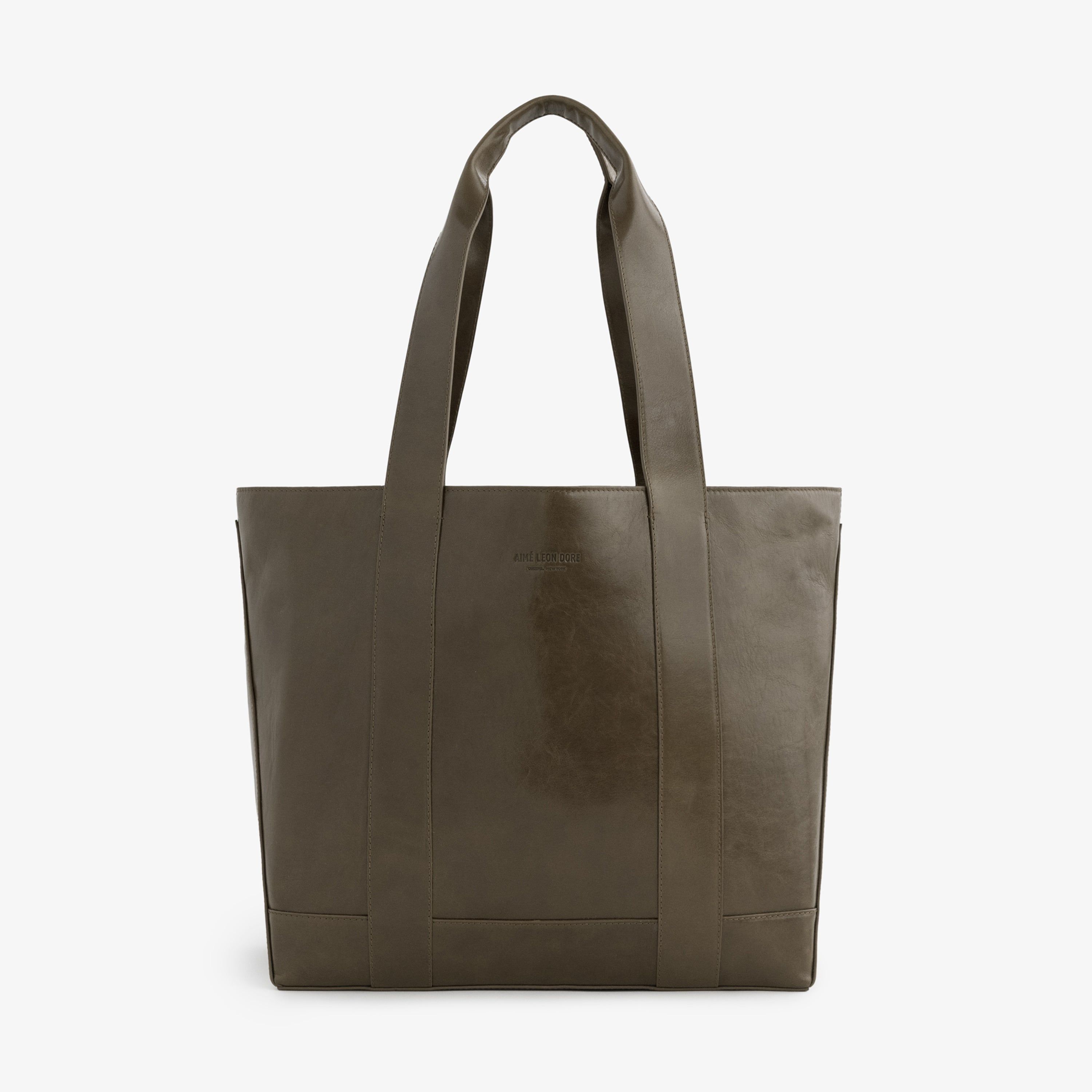 Debossed Logo Leather Tote Bag sold by Aime Leon Dore