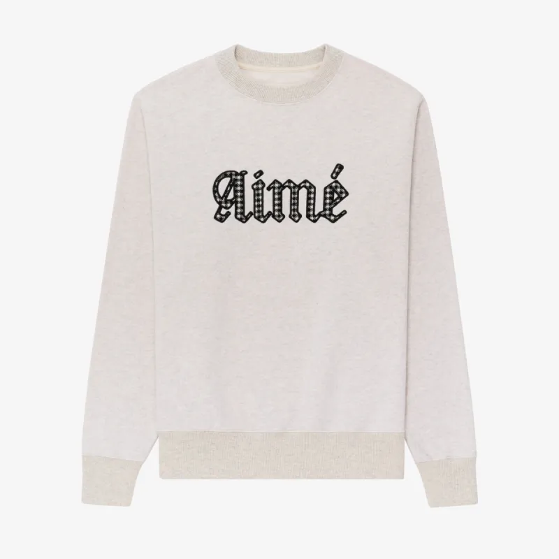 Houndstooth Appliqué Crewneck Sweatshirt sold by Aime Leon Dore