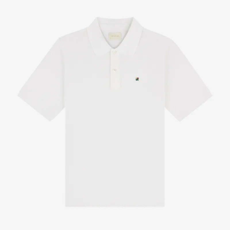 Crest Piqué Polo sold by Aime Leon Dore