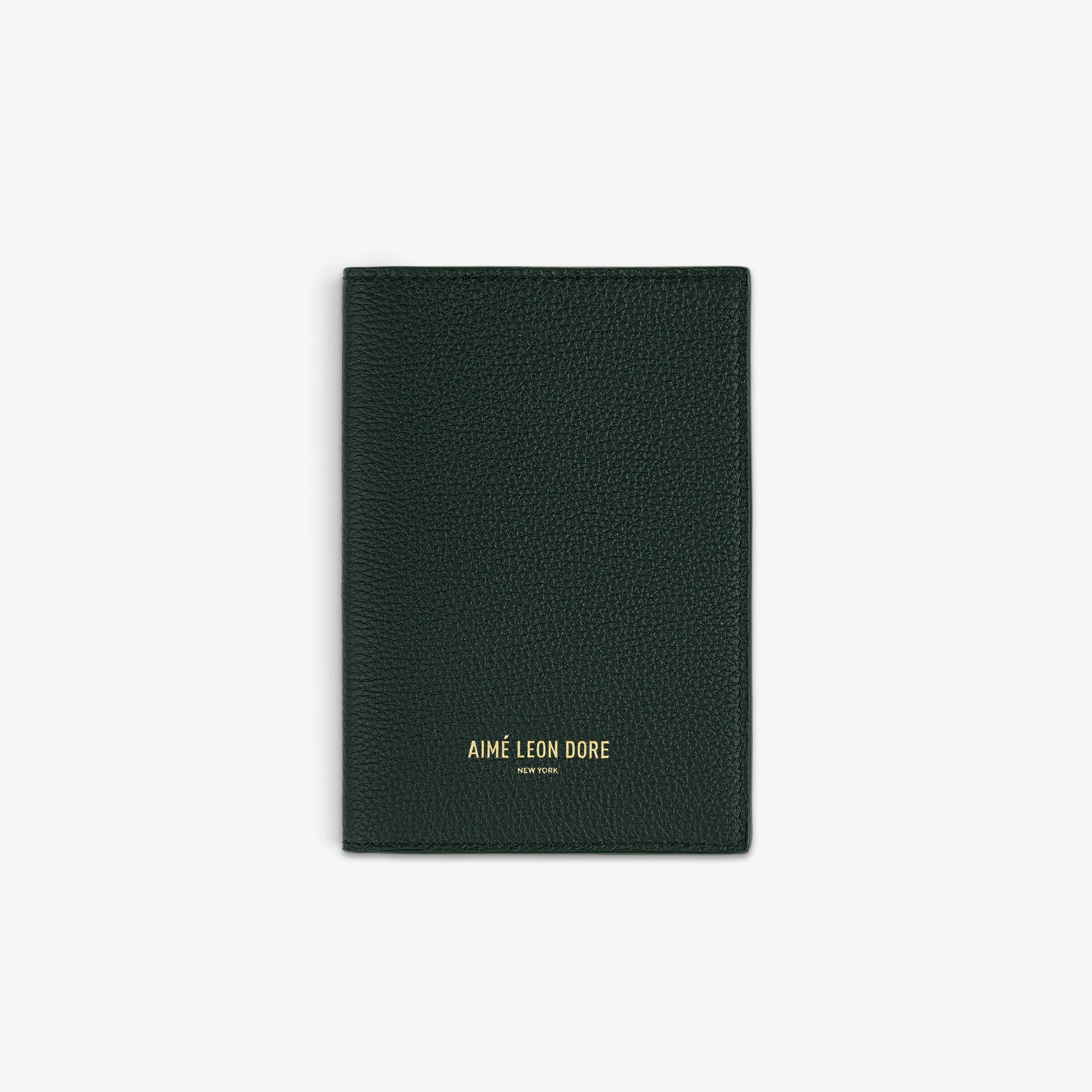 Leather Passport Holder sold by Aime Leon Dore