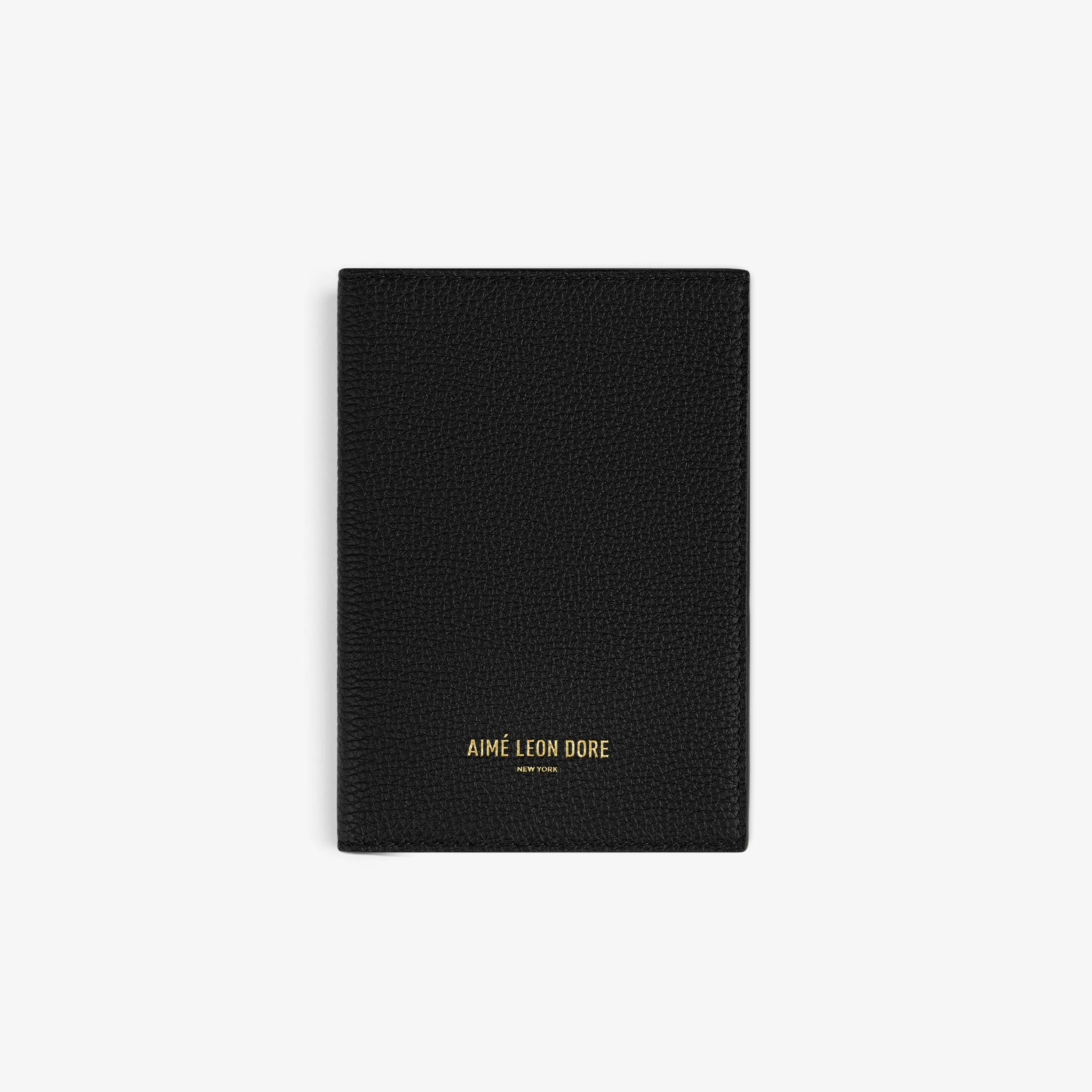 Leather Passport Holder sold by Aime Leon Dore