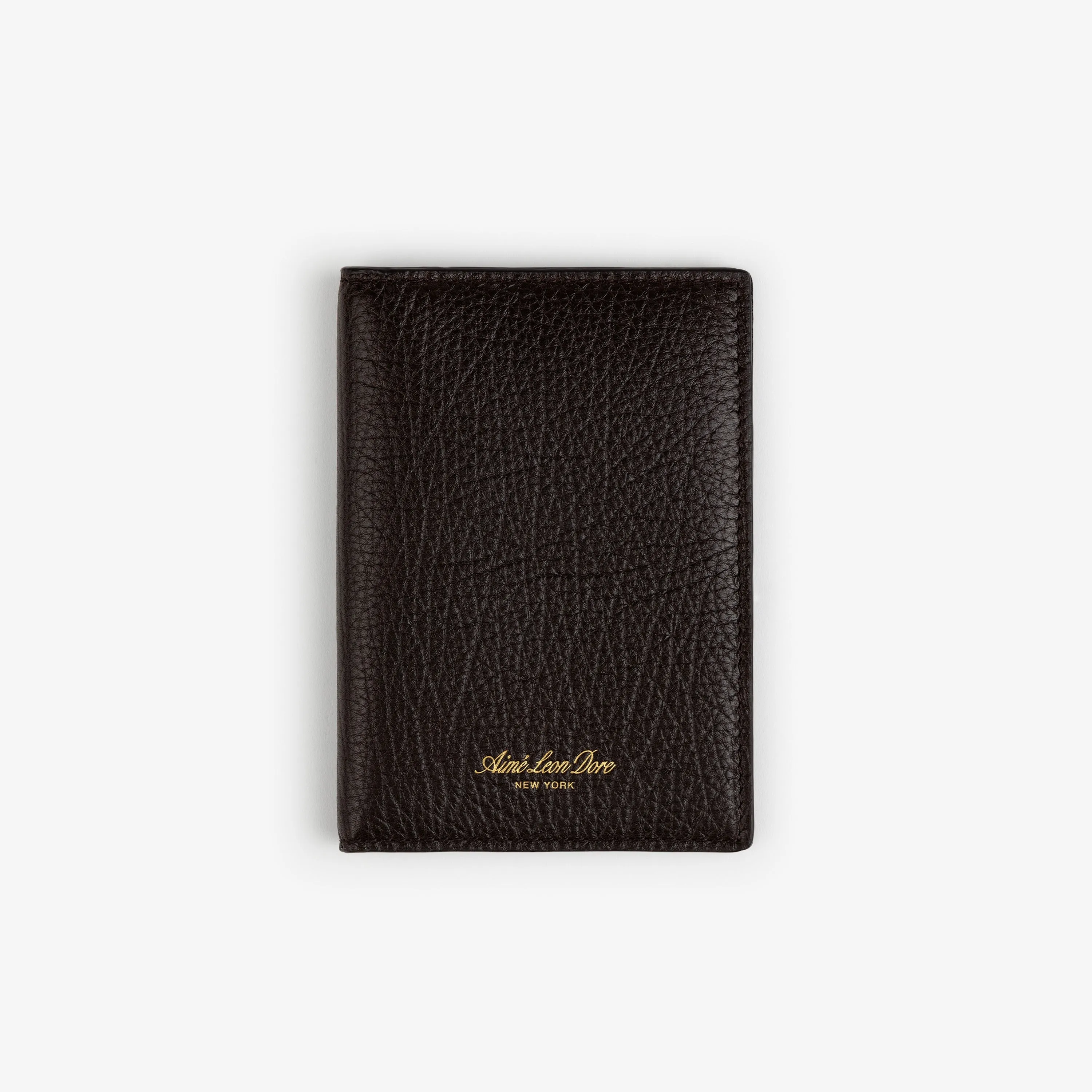 Tumbled Leather Passport Holder sold by Aime Leon Dore