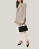 Chill Out Frame Clutch sold by Aimee Kestenberg