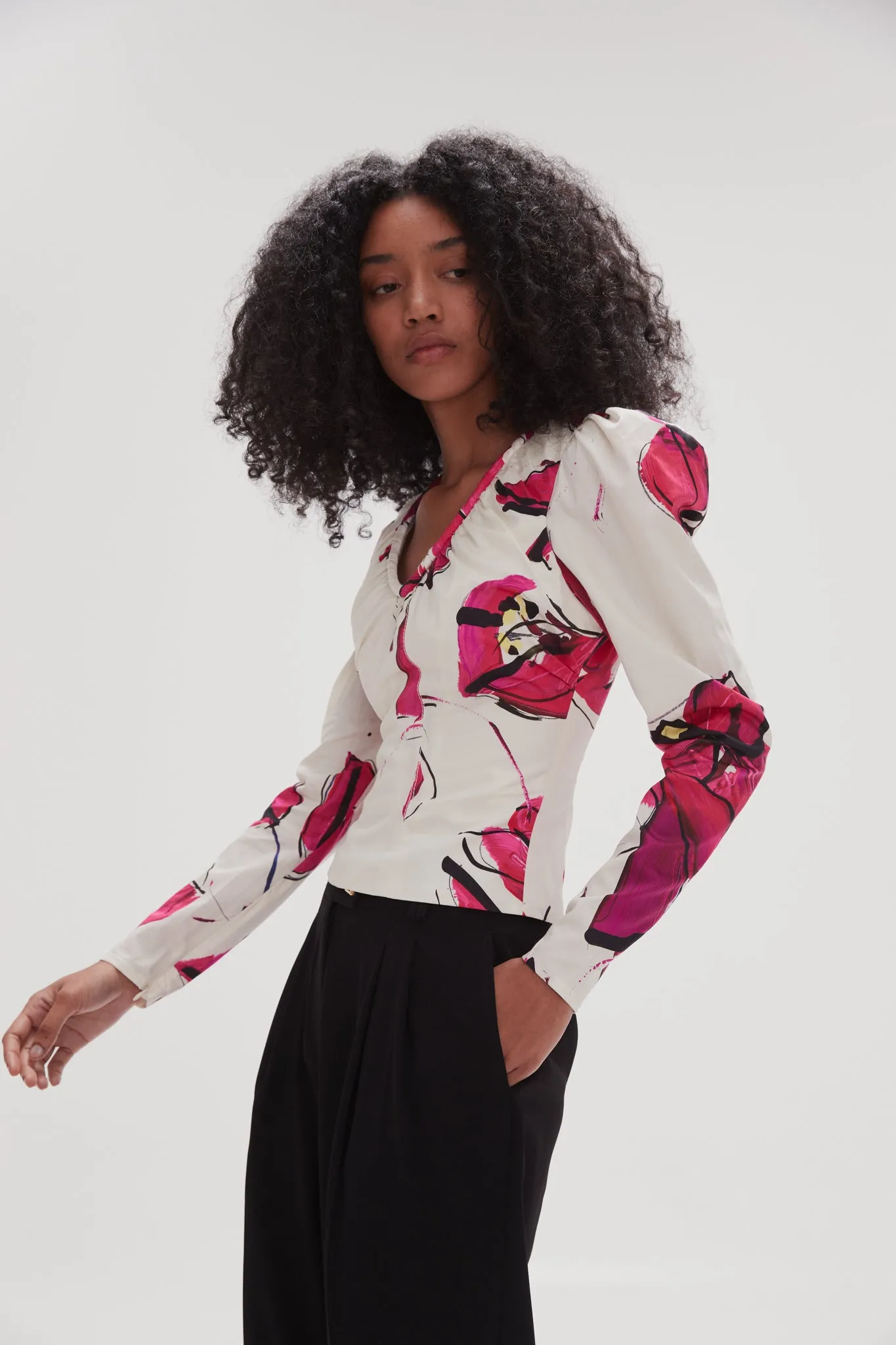 Whimsical Plunge Top sold by Aje