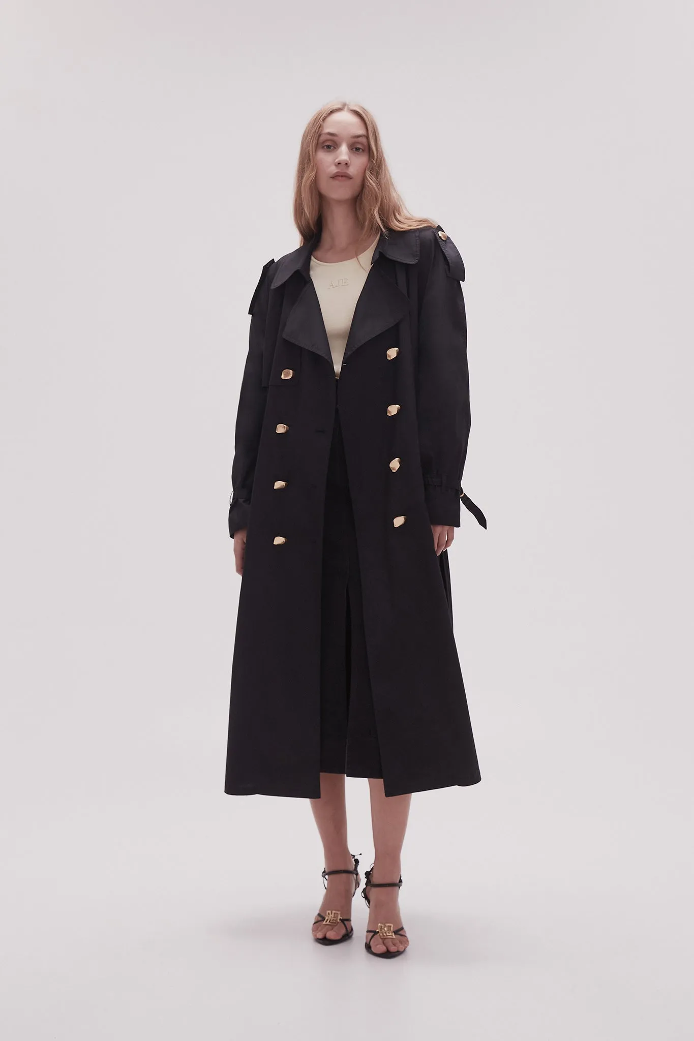 Prima Pleat Trench Coat sold by Aje