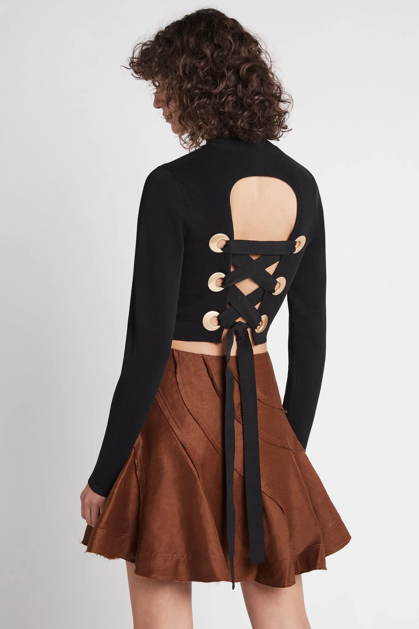 Virtuous Lace-Up Knit Top sold by Aje