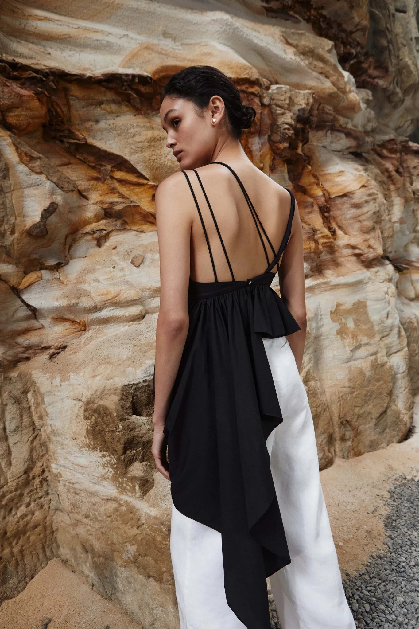 Karina Asymmetric Drape Top sold by Aje