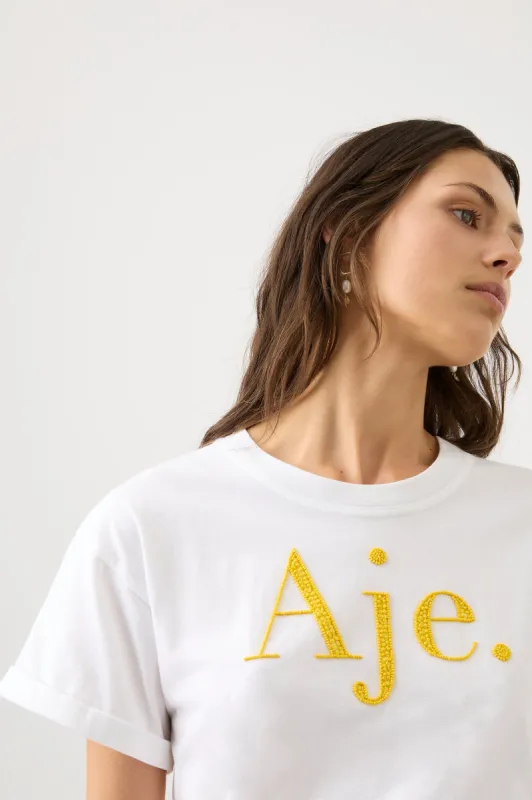 Remi Embellished Logo Tee sold by Aje