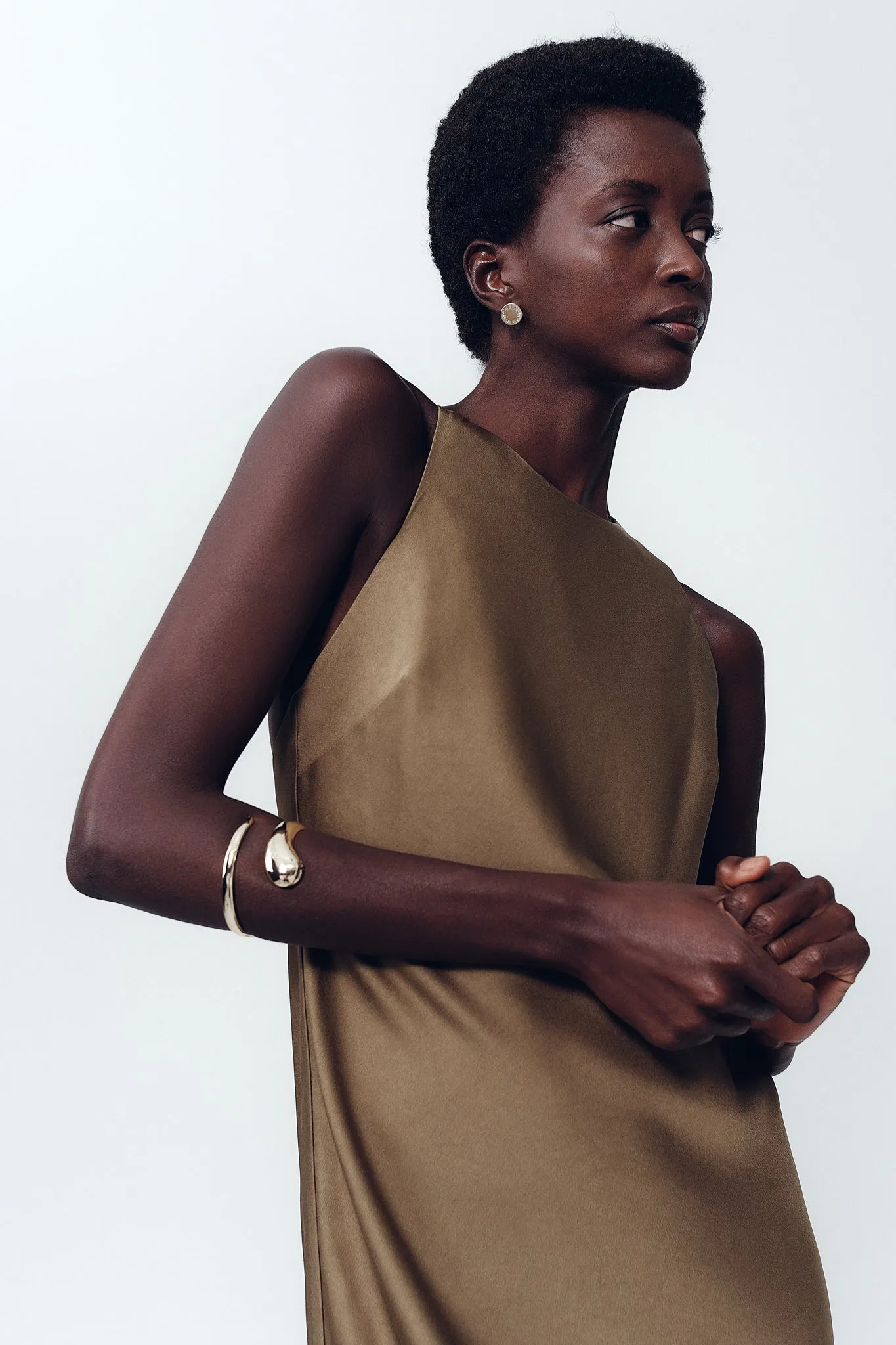 Momentum Asymmetric Cuff sold by Aje