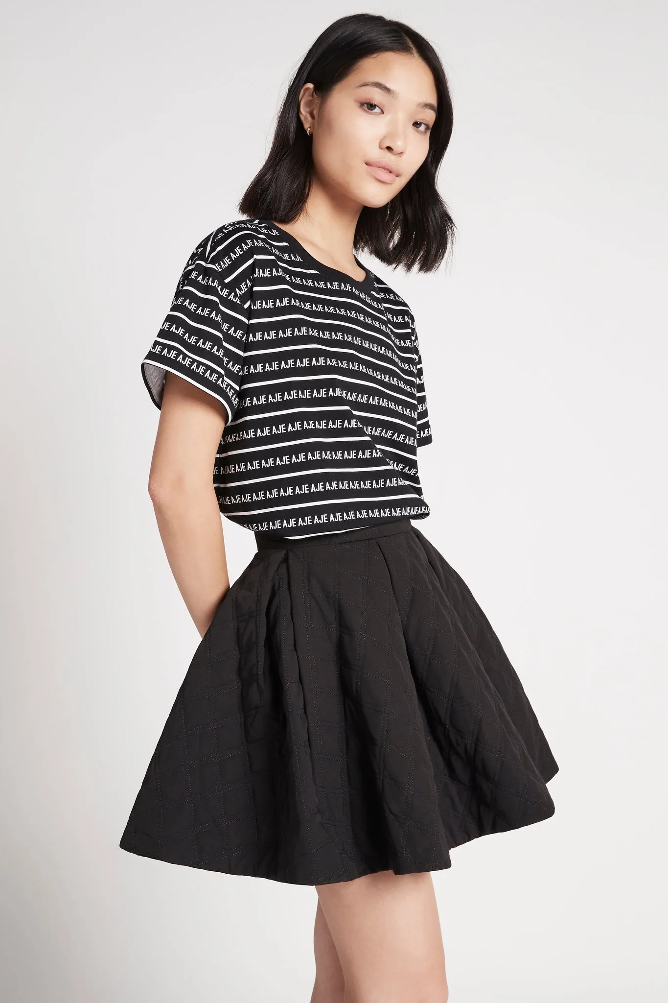 Promise Quilted Mini Skirt sold by Aje