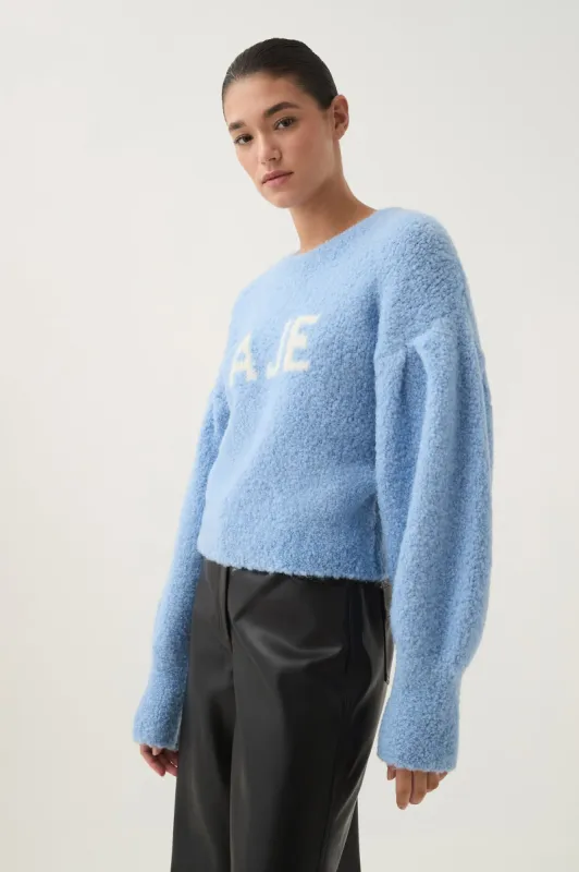 Moment Logo Knit sold by Aje