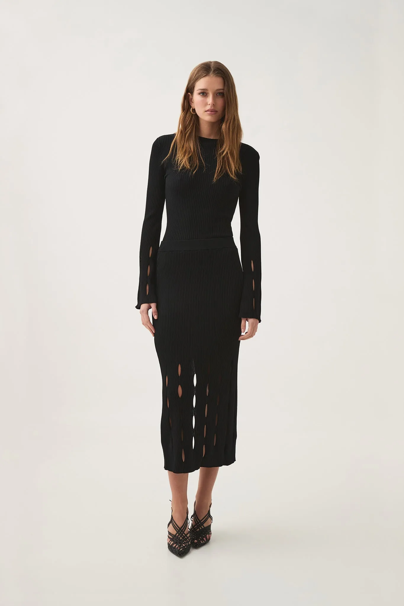 Resolution Knit Midi Skirt sold by Aje