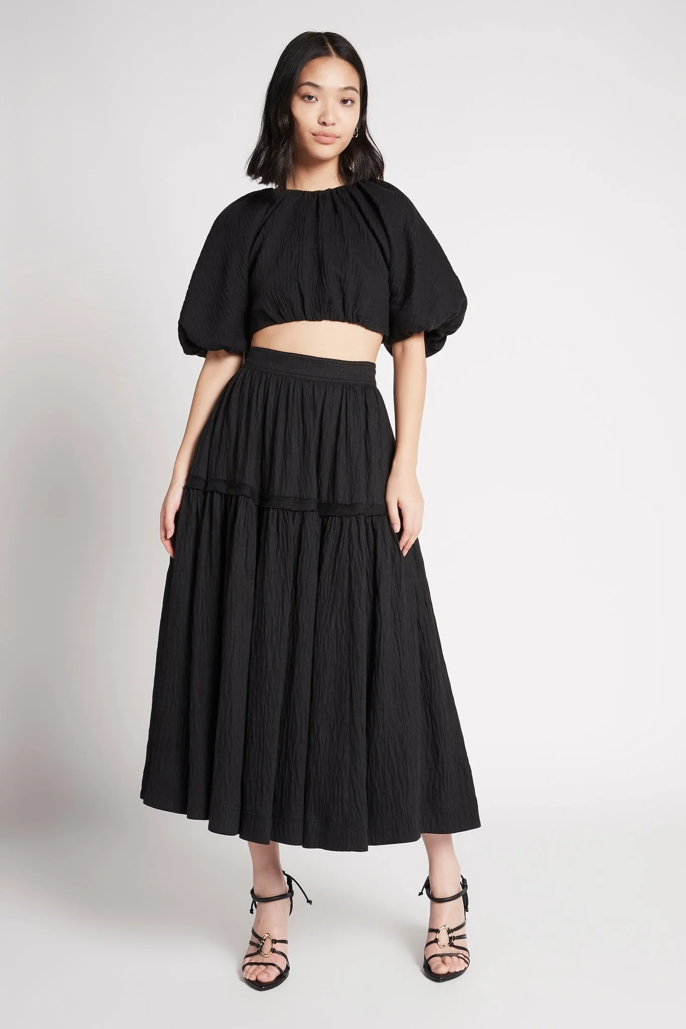 Admiration Gathered Midi Skirt sold by Aje