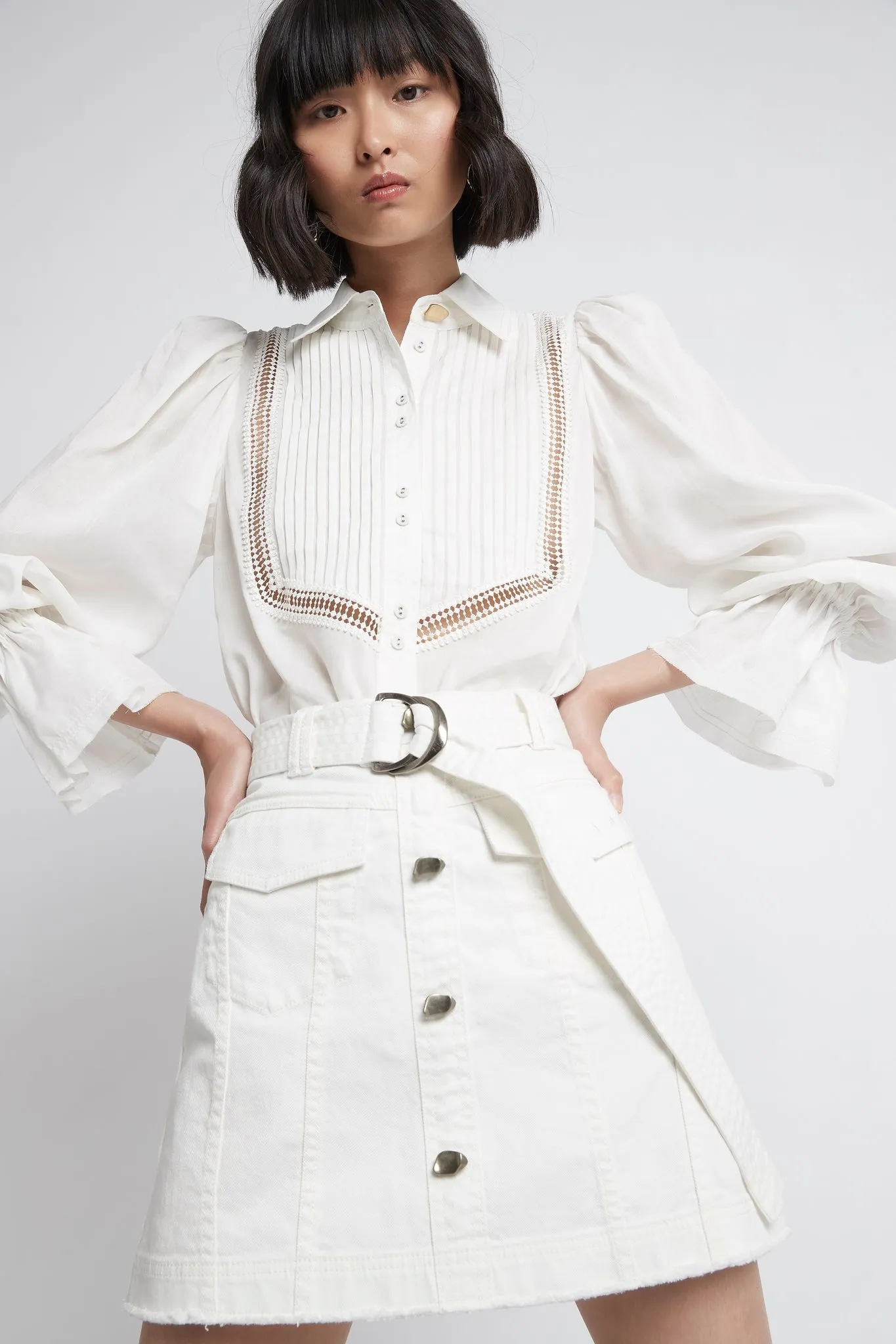 Arlow Denim Mini Skirt sold by Aje