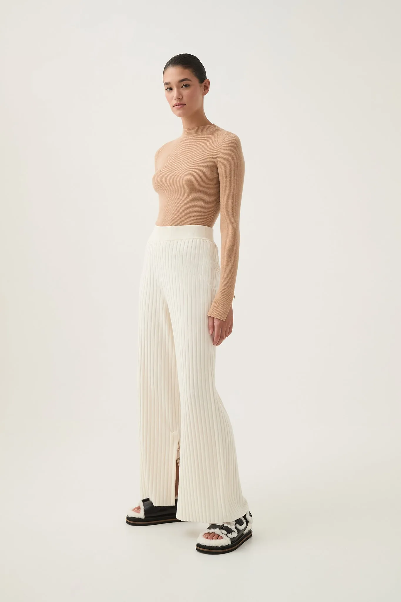 Archer Logo Trim Knit Pant sold by Aje