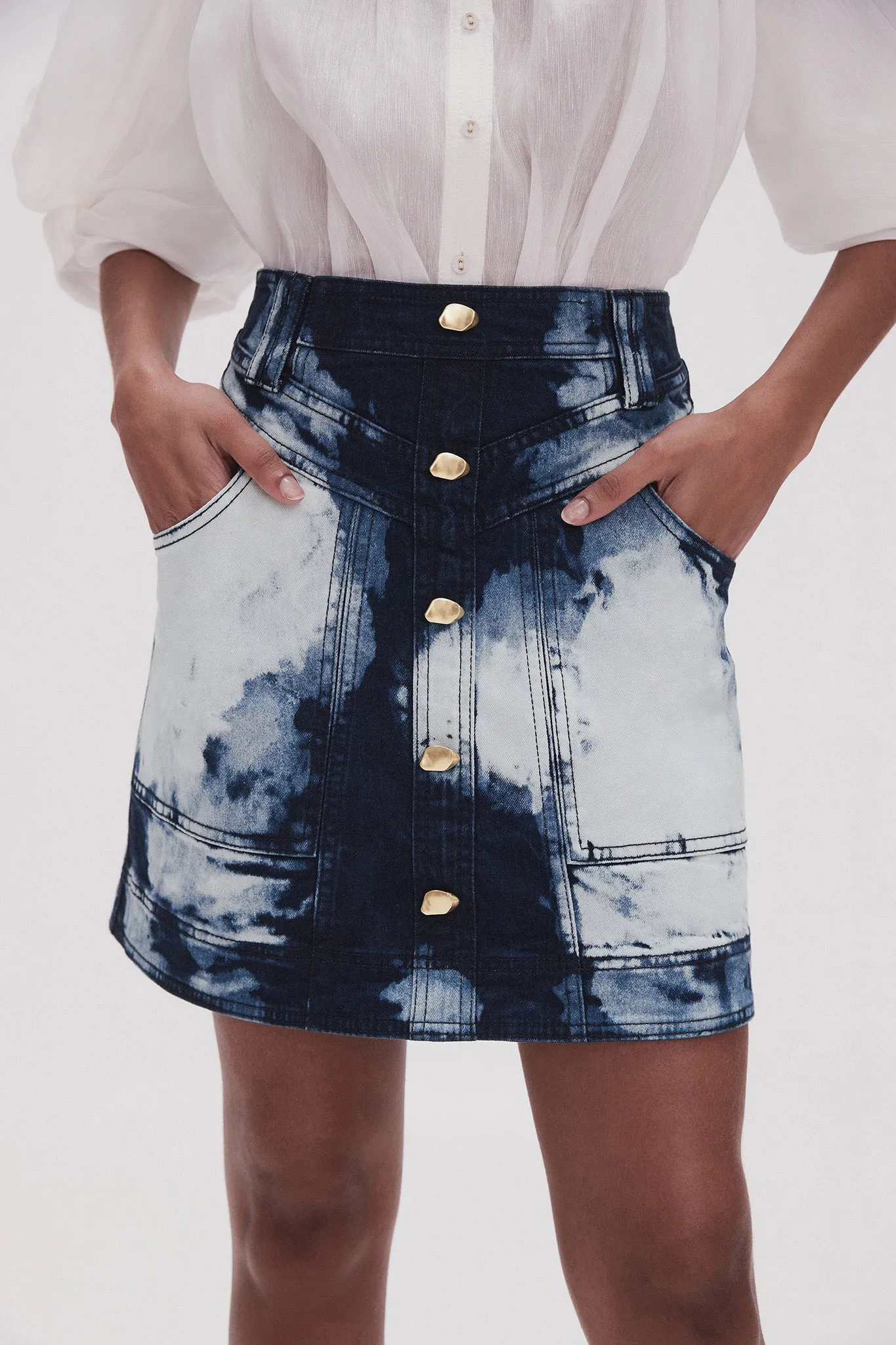 Enigma Denim Mini Skirt sold by Aje