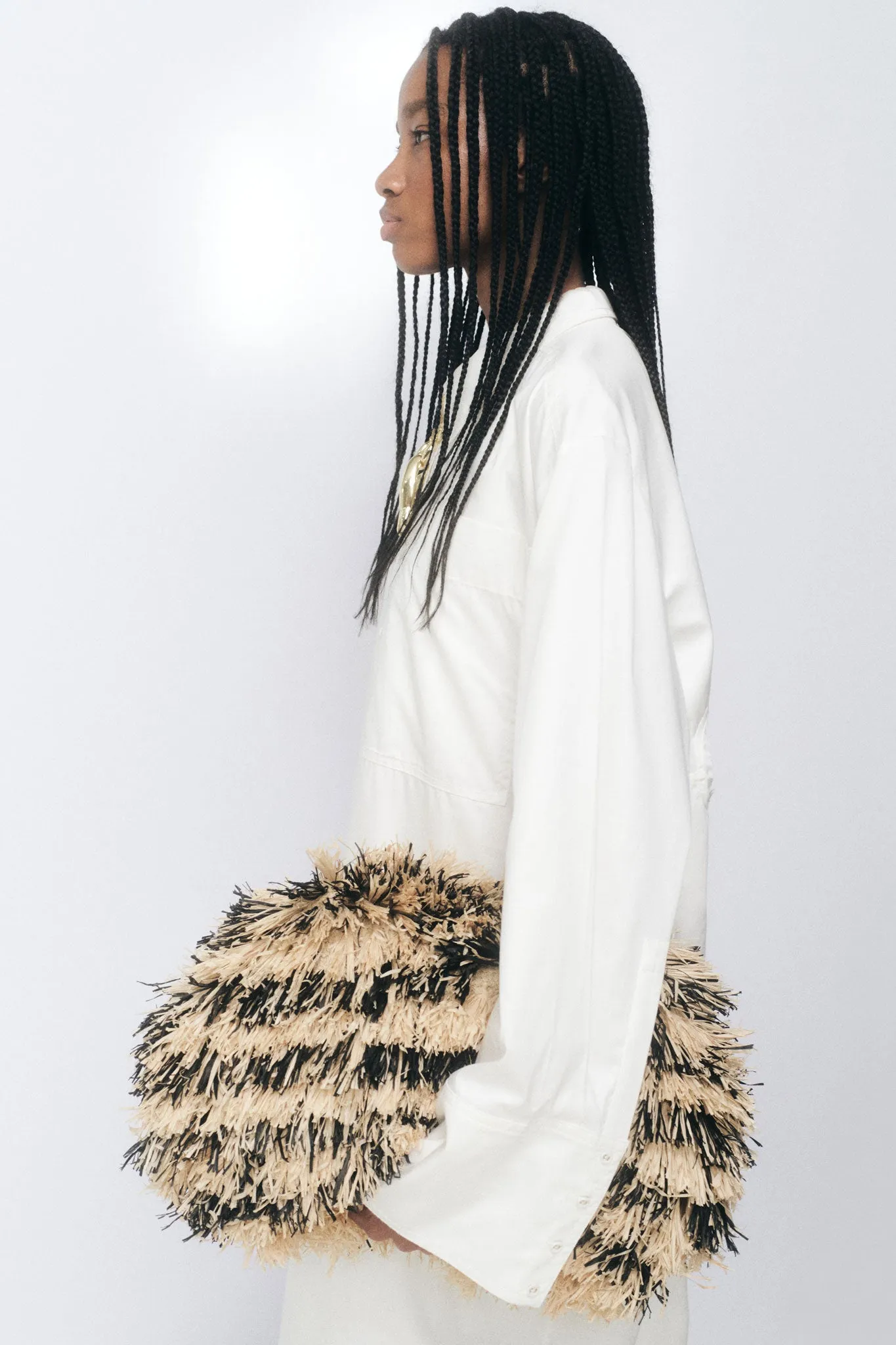 Accord Fringe Frame Clutch sold by Aje