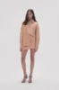 Priscilla Scalloped Mini Skirt sold by Aje