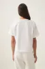 Glint Embellished Logo Tee sold by Aje