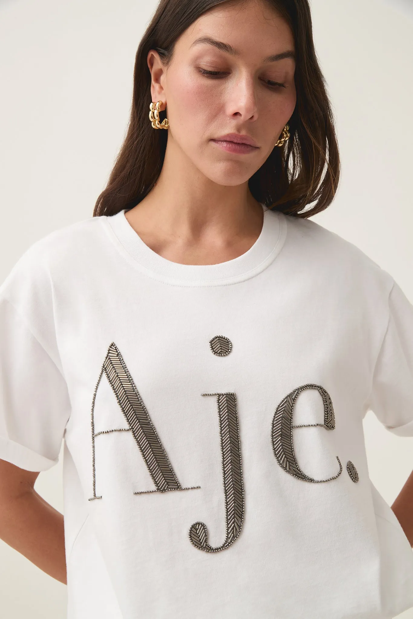 Glint Embellished Logo Tee sold by Aje