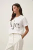Glint Embellished Logo Tee sold by Aje