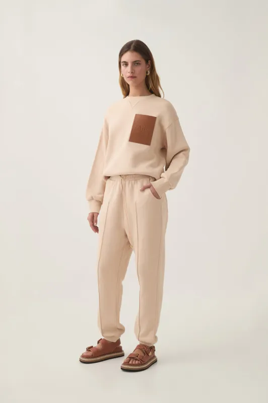 Flores Trackpant sold by Aje