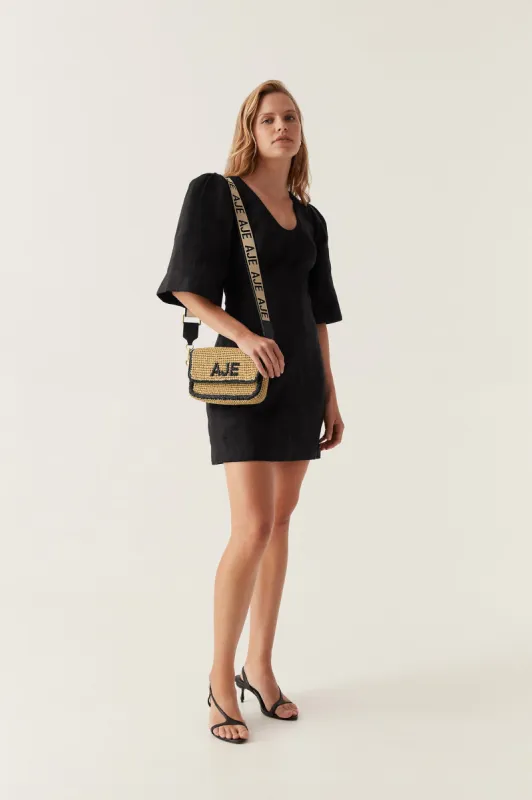Hunter Twisted Mini Dress sold by Aje