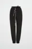 Belted Windbreaker Pant 502 sold by Aje