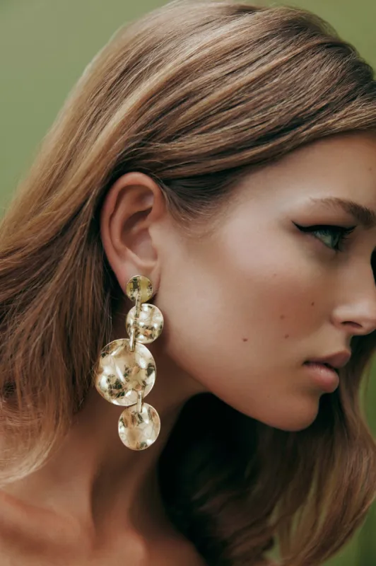 Ola Mobile Drop Earring sold by Aje