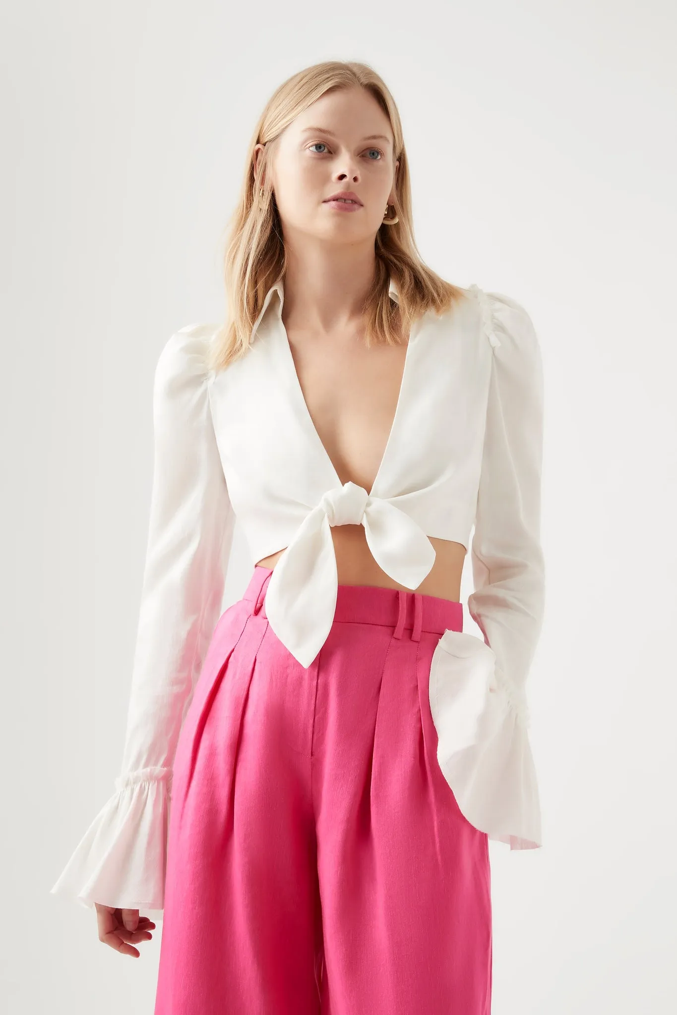 Nicole Twist Top sold by Aje