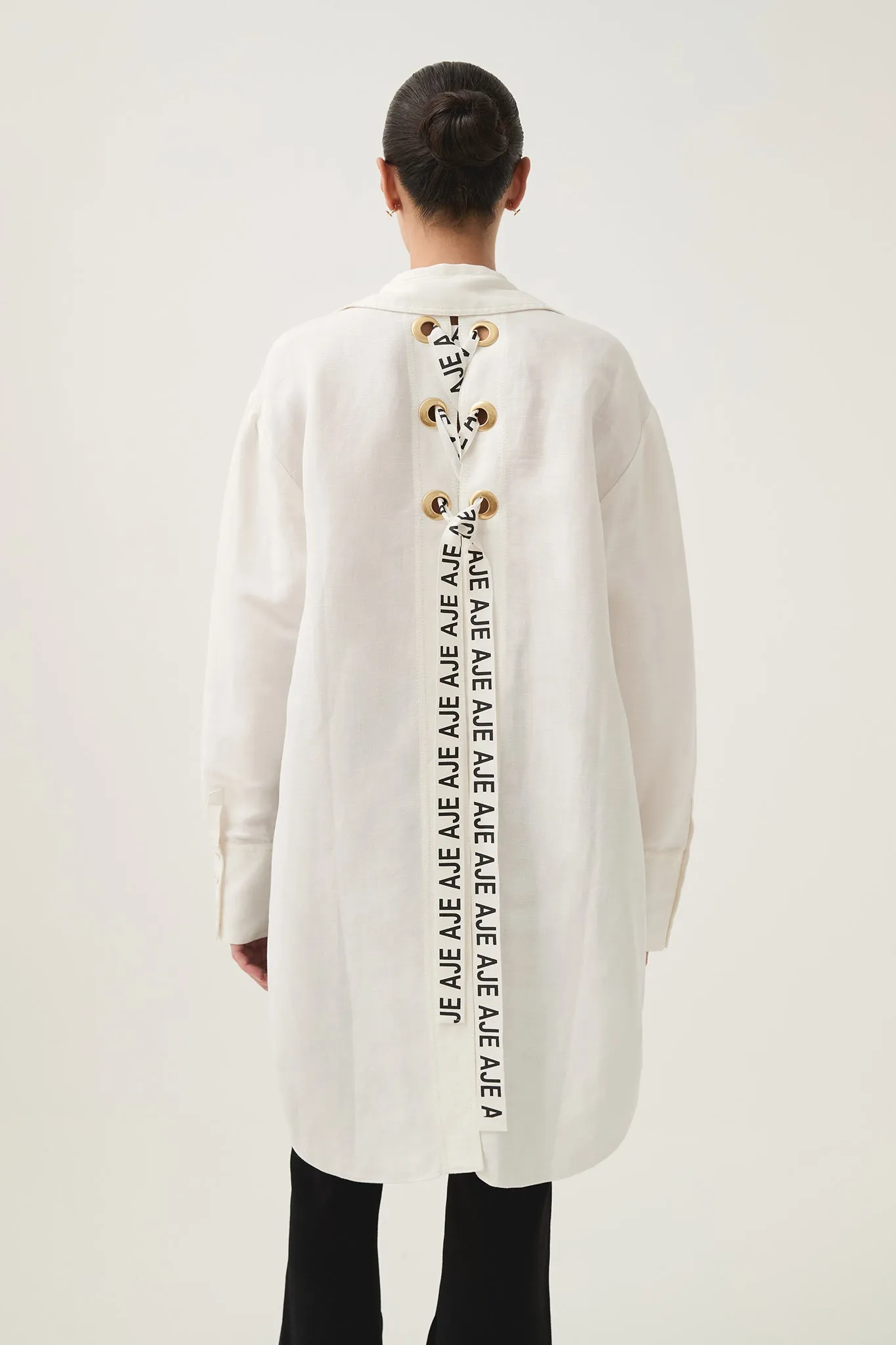 Virtuous Lace-Up Longline Shirt sold by Aje