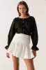 Carrie Ruched Mini Skirt sold by Aje