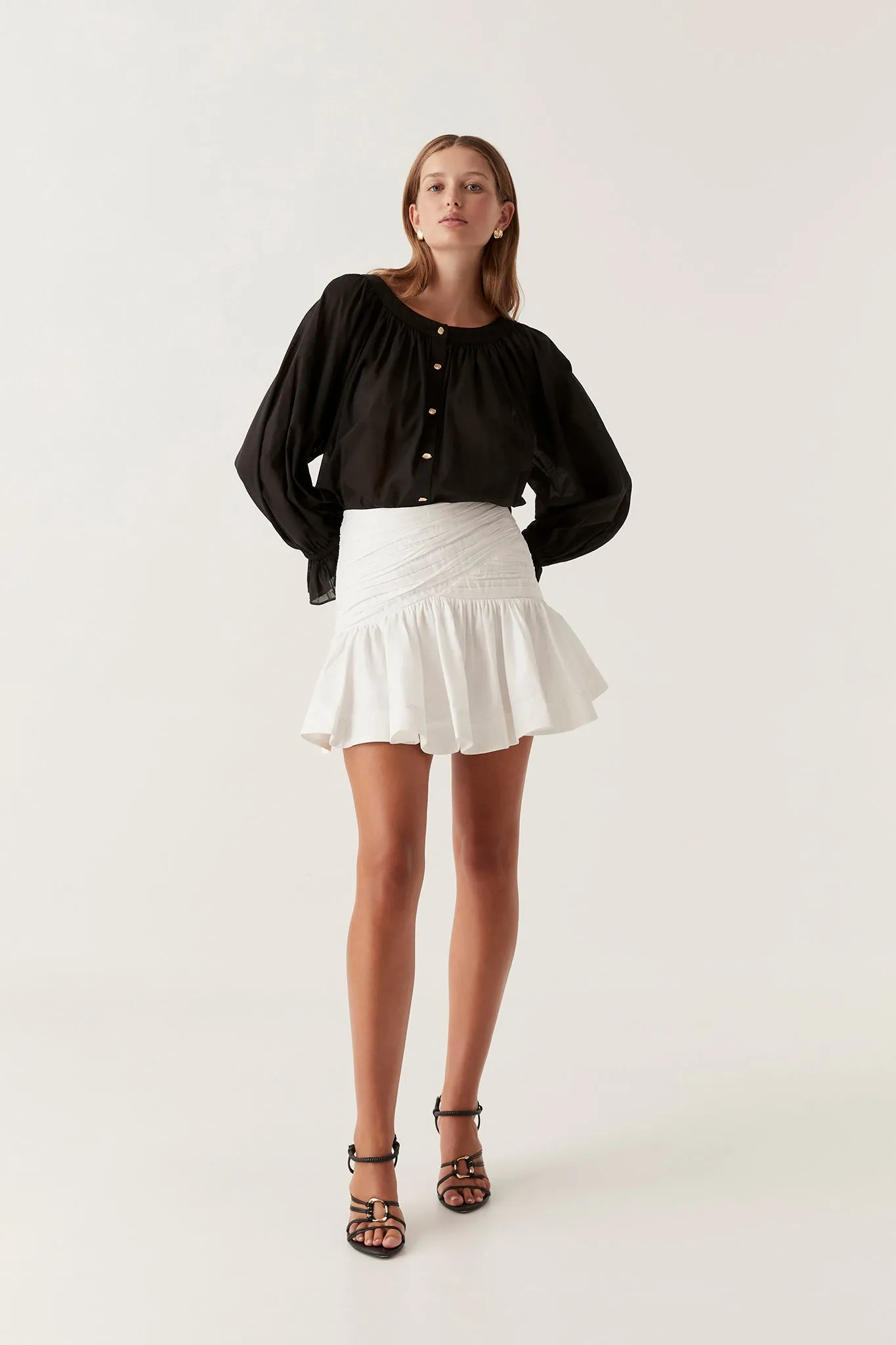 Carrie Ruched Mini Skirt sold by Aje